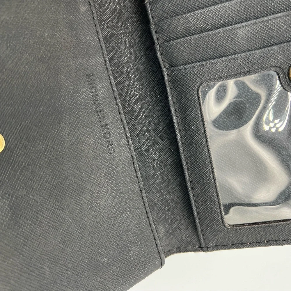 Michael Kors brown and White Stripe Zip Wristlet